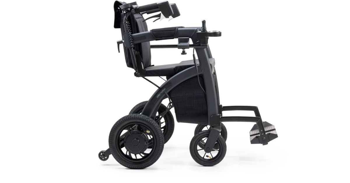 Travel wheelchair A lightweight travel wheelchair with footplates on a white background