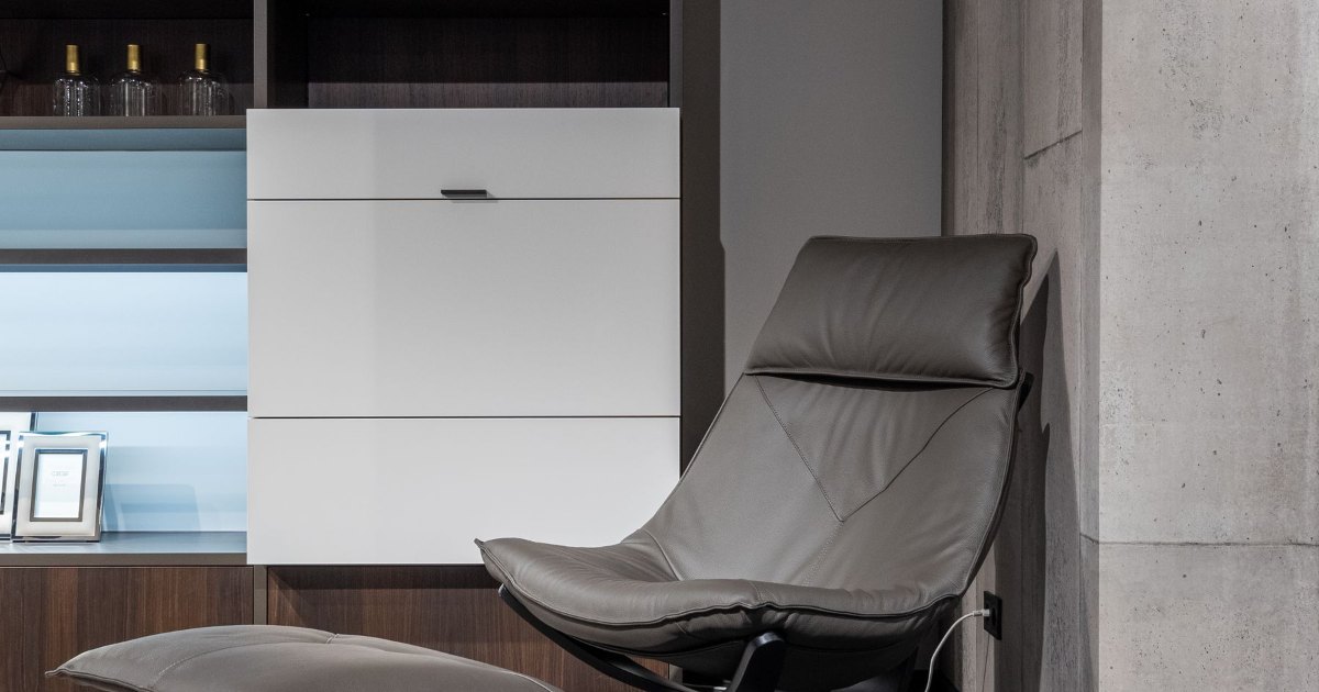 Reclining chair in a living room A reclining chair positioned in a modern living room