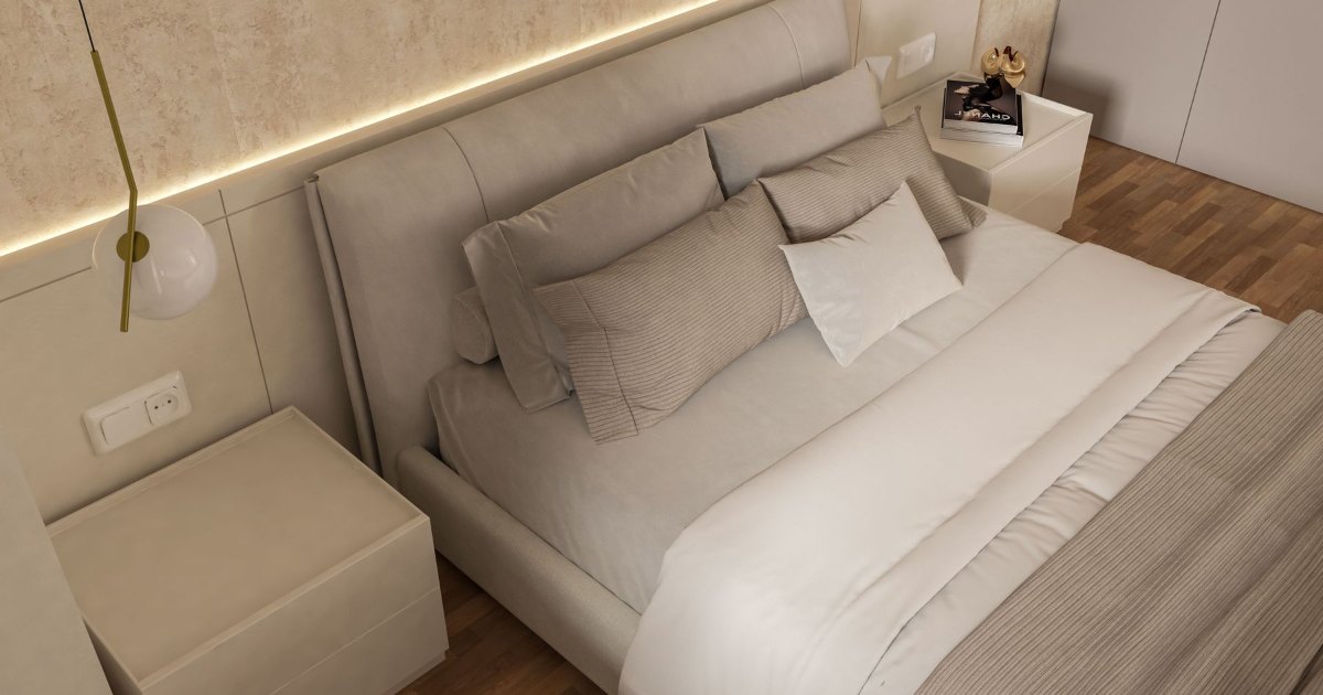 A bed made up with crisp white linen