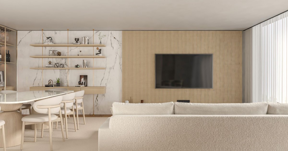 A bright white living room with a low sofa