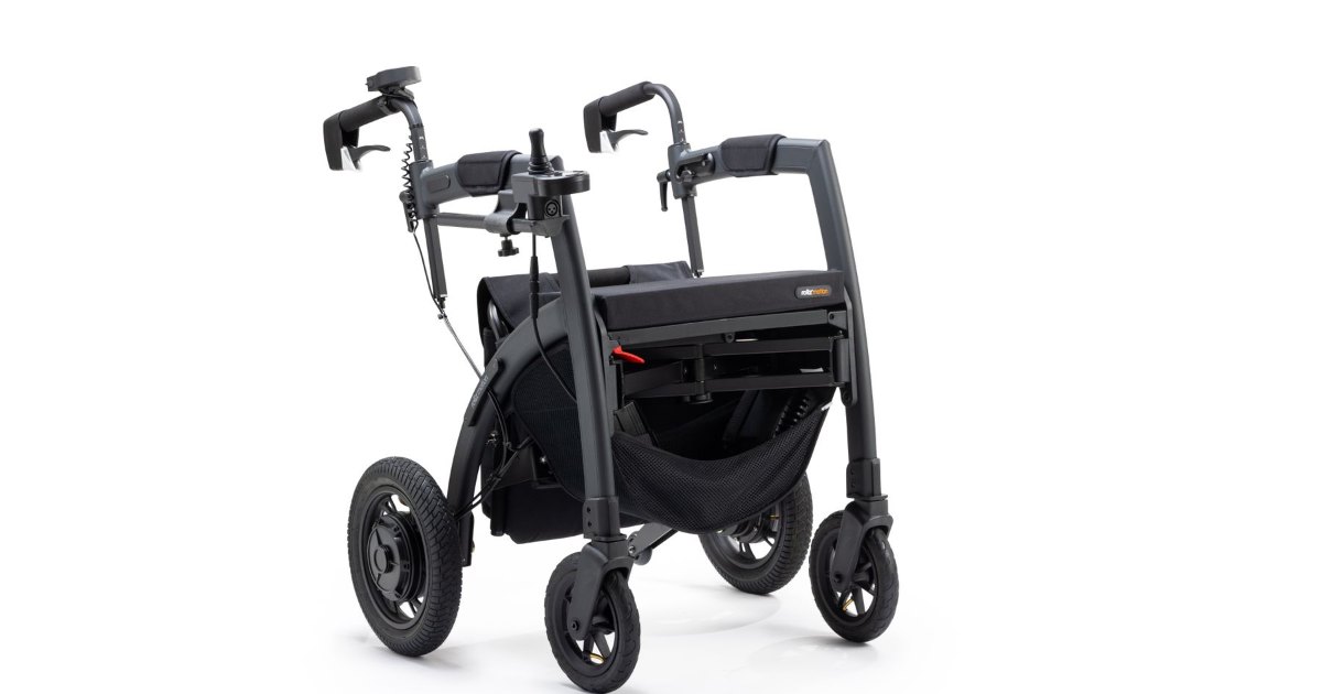 A folding wheelchair with a padded seat and backrest on a white background