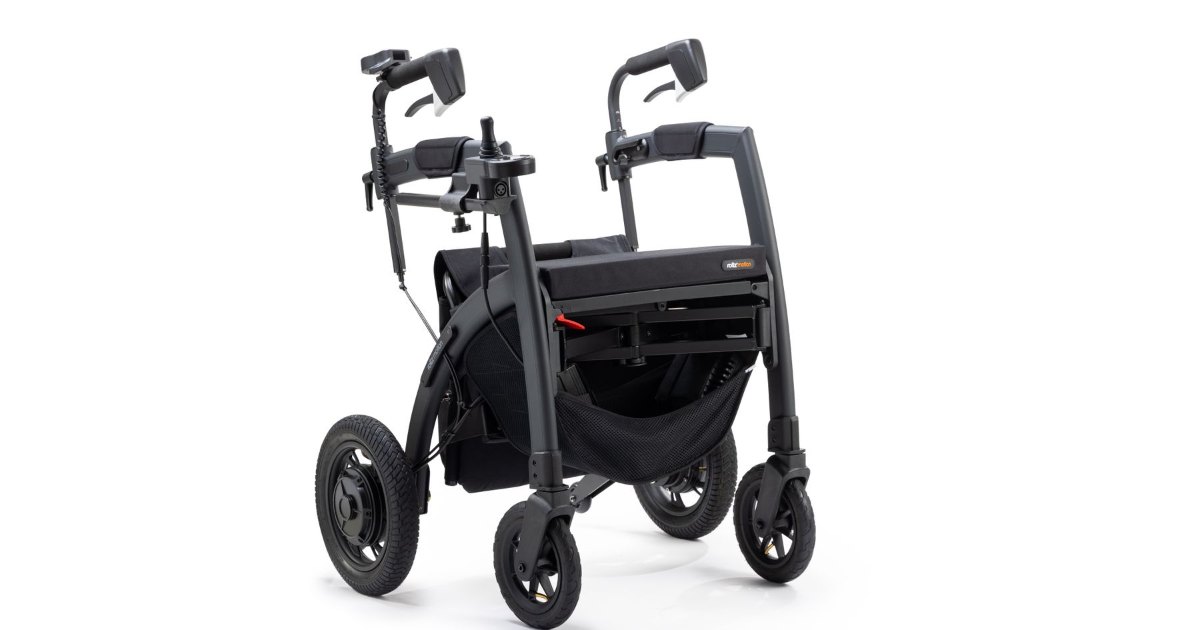 Transport wheelchair side view A side view of a folding transport wheelchair on a white background