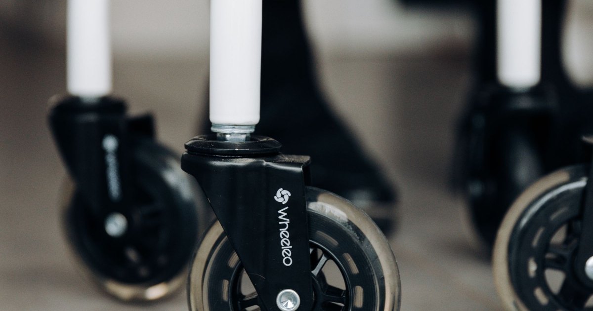 Rollator wheels close up A close view of the wheels of a modern rollator on a smooth floor