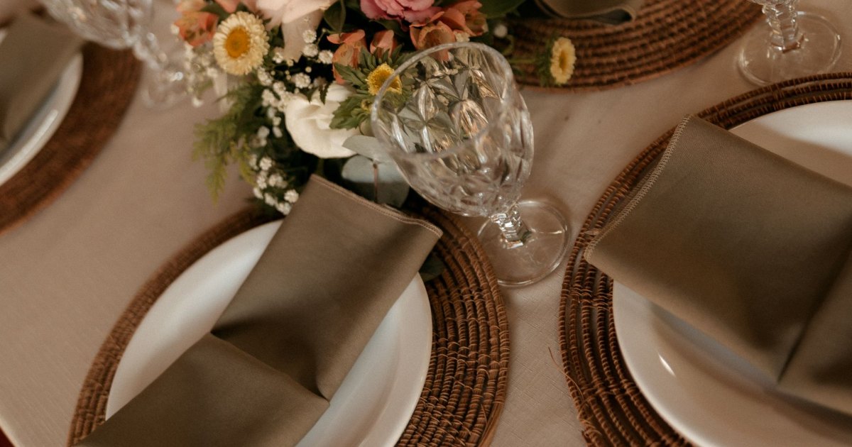 Table with flowers A dining table laid with flowers and place settings