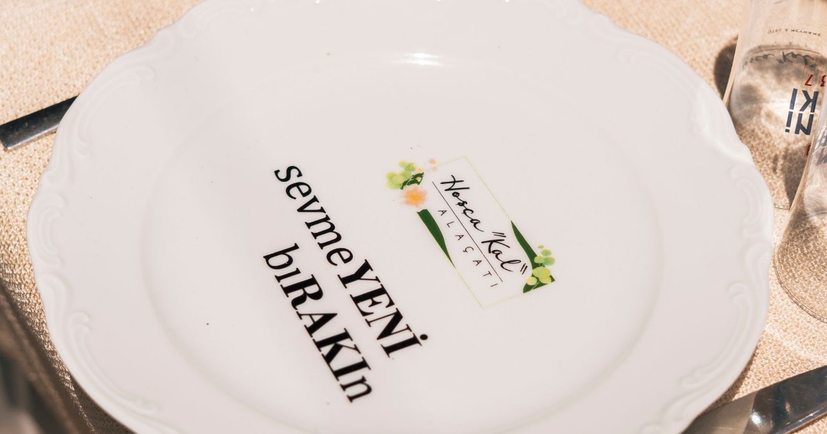 Plate on a table A single white plate on a table