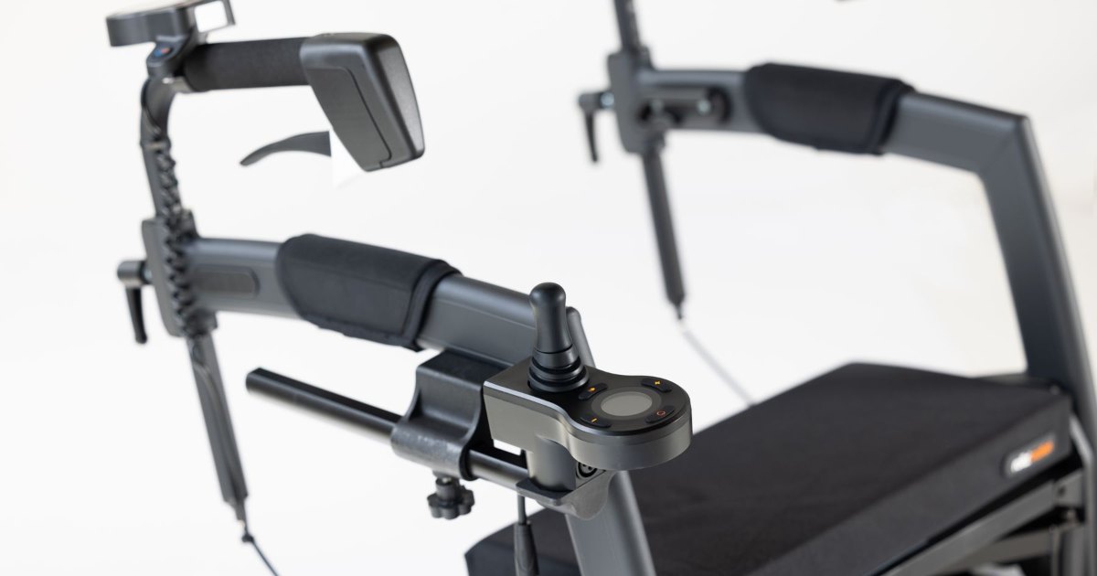 Powered mobility aid with joystick control A powered mobility aid with a black frame and joystick controller on a white background