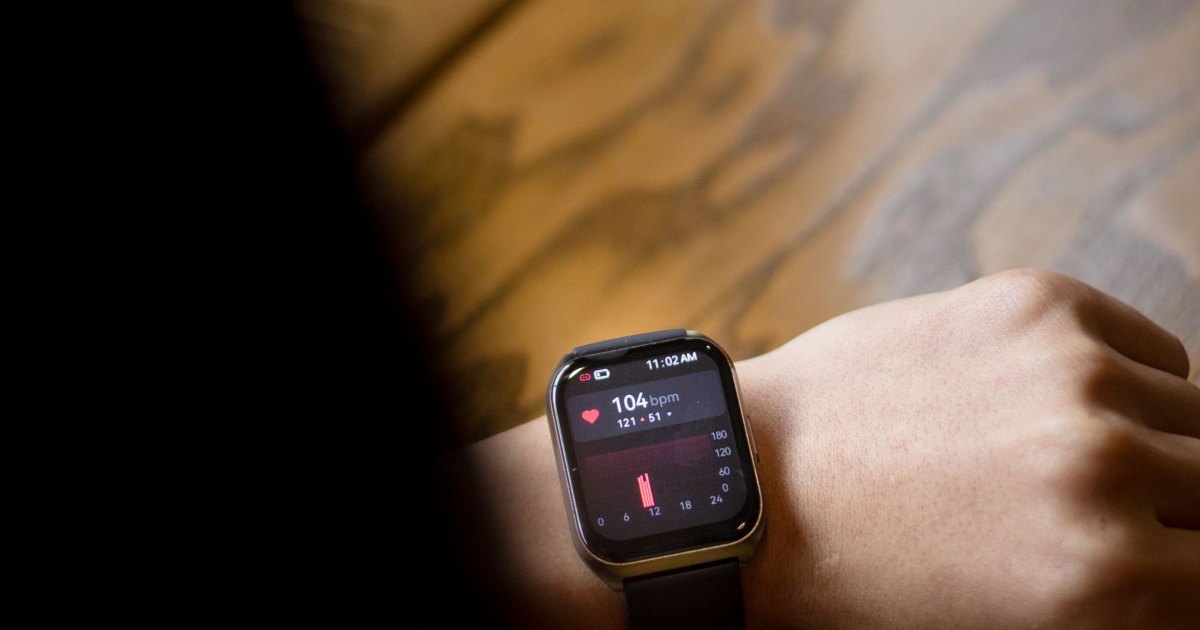 A close view of the display of a smartwatch on a wrist