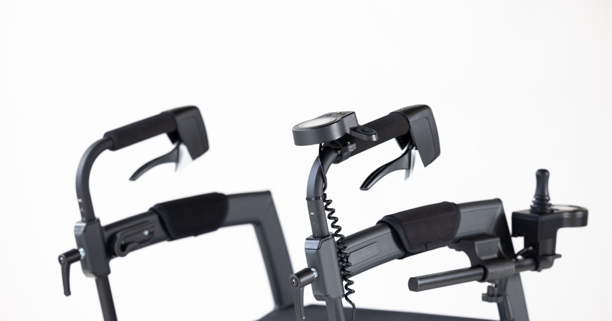 A close view of the armrest and control unit of a powered wheelchair