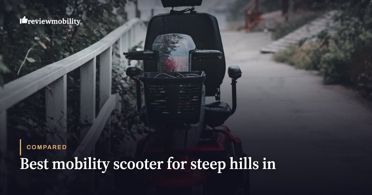 A mobility scooter parked on a path beside a railing, for an article comparing scooters for steep hills.