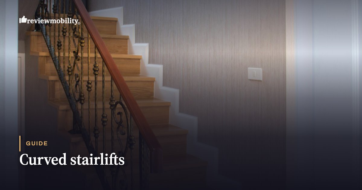 Curved stairlifts Curved wooden staircase with a decorative iron railing in a home, used as a guide image for curved stairlifts.