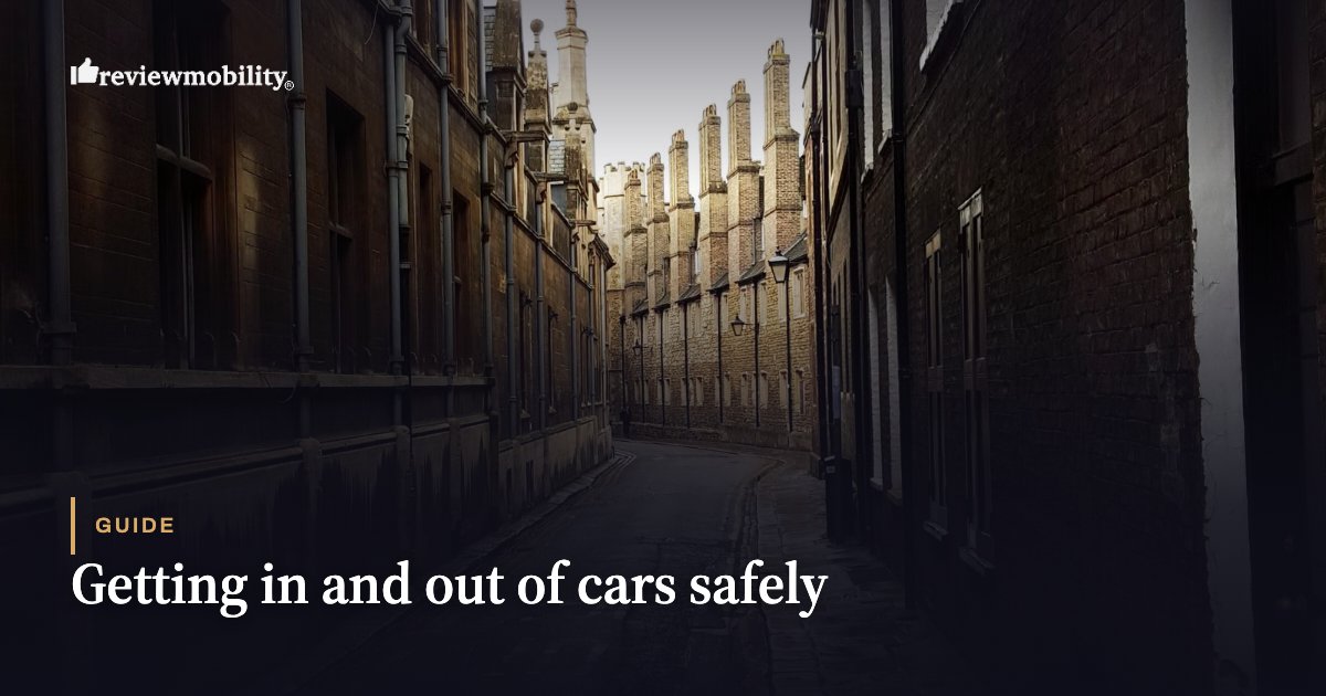 Dark narrow brick alley with light at the end; overlaid title 'Getting in and out of cars safely' for a guide by Review Mobility.