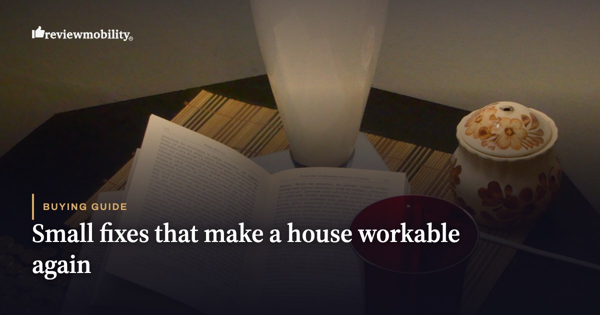 Small fixes that make a house workable again An open book beside a lit table lamp in a dim room. Small fixes that make a house workable again