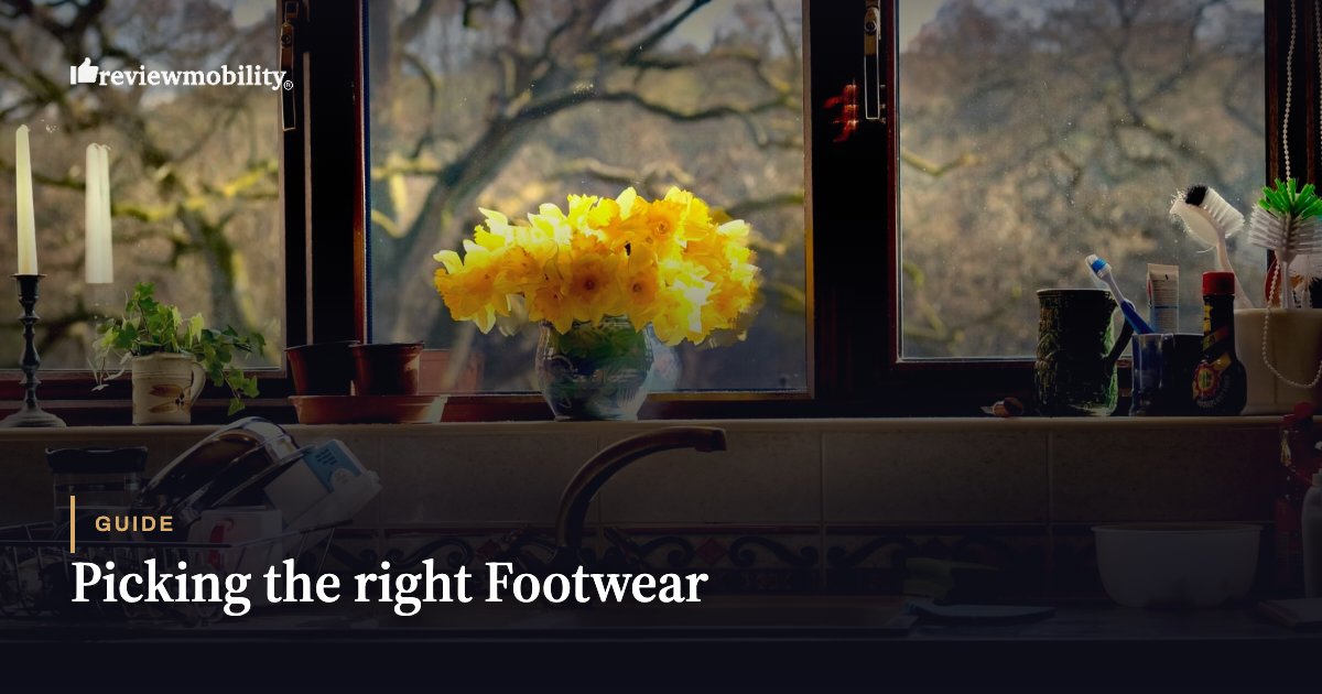 Review Mobility logo in upper left; yellow flowers on a windowsill with kitchen items, overlay text 'Guide: Picking the right Footwear'.