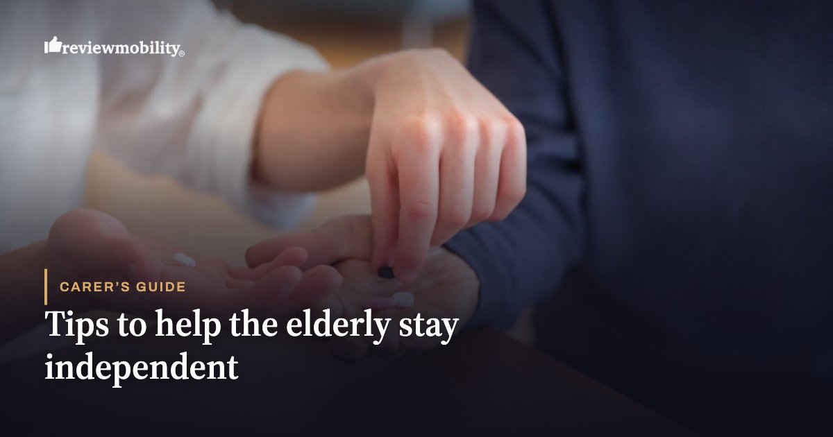 Tips to help the elderly stay independent Caregiver helping an elderly person with their pills, logo in the corner, for an article on tips to keep seniors independent.