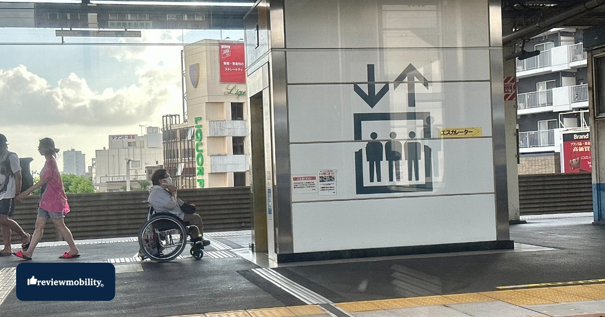 tga-mobility-whill-c-lite-folding-carbon-fibre-powerchair-uk Wheelchair user on a station platform