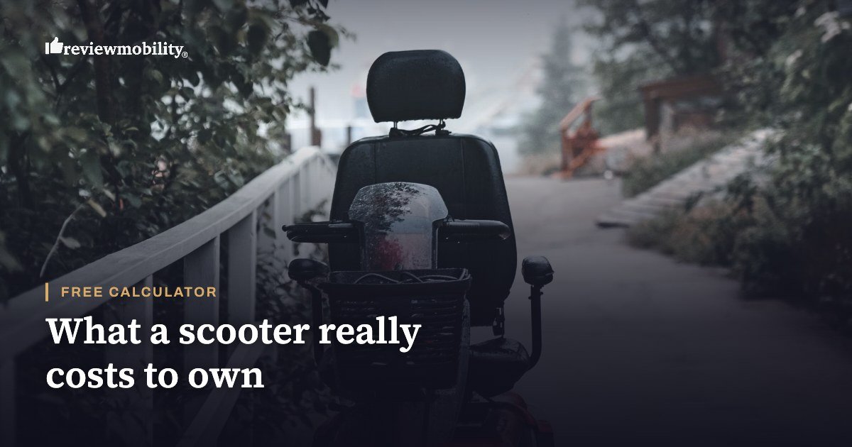Mobility scooter total cost calculator A mobility scooter parked on a wet path lined with trees